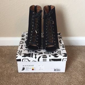 BRAND NEW! Black lace up booties.